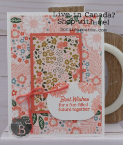 Basic White and Calypso Coral card with flower patterned paper and the sentiment "Best Wishes for a fun-filled future together" on a oval shape